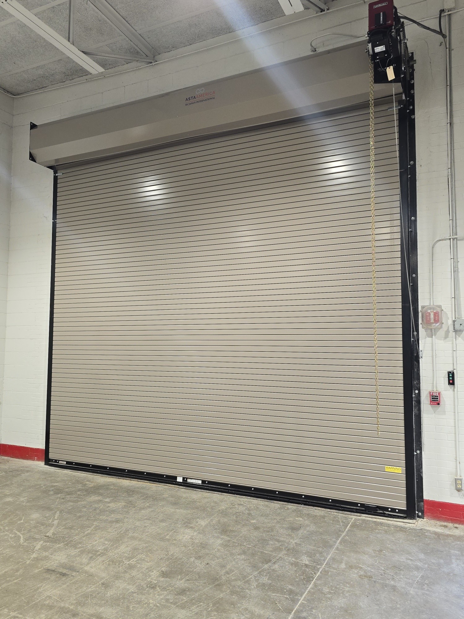 Industrial gray roll-up garage door.