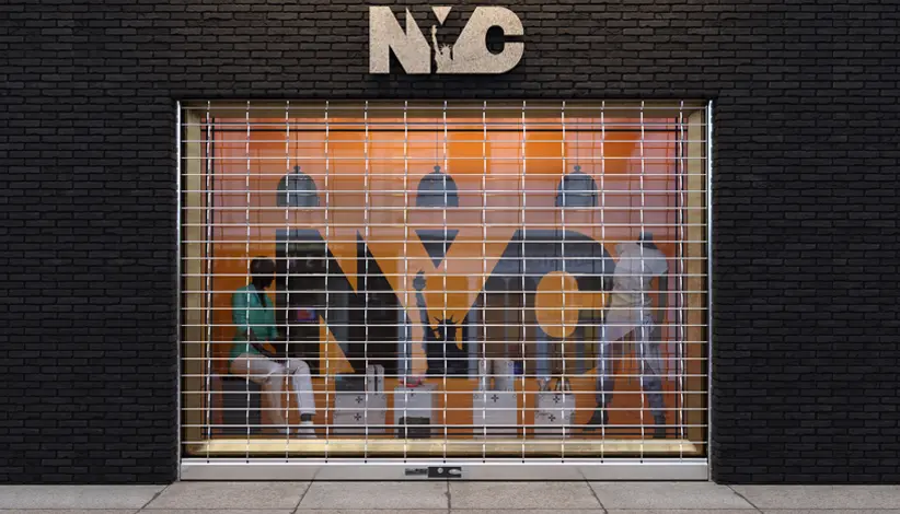 Storefront with NYC logo and mannequins.