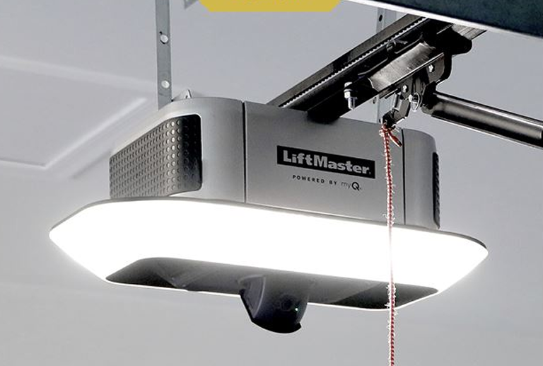 Ceiling-mounted LiftMaster garage door opener unit.